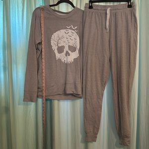 Pajama set with skull graphic size small light gray pants and long sleeve shirt